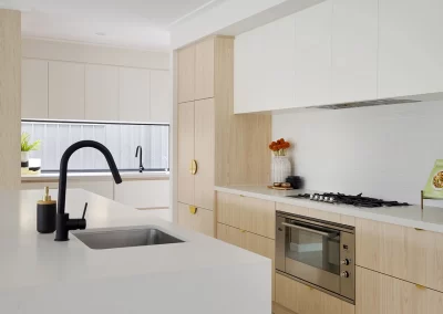 Renovated kitchen with modern cabinetry and open-plan layout